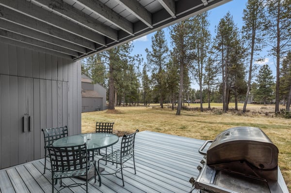 Your private deck offers peaceful moments with morning coffee and BBQ dinners, overlooking serene meadows and towering pines.