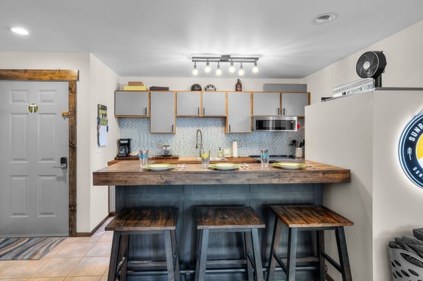 Modern comfort meets cozy charm. Enjoy a bright, open kitchen with sleek finishes, a spacious breakfast bar, and everything you need to gather, dine, and unwind